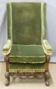 19thC mahogany upholstered wing back armchair with shaped apron, moulded detail and gnurled feet,