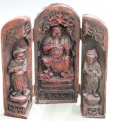 A large collection of ethnic items including Chinese Buddhas, Indian bronze deities, African