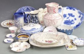 A collection of ceramics including Dresden style pierced basket, Quimper, Victorian jugs, George