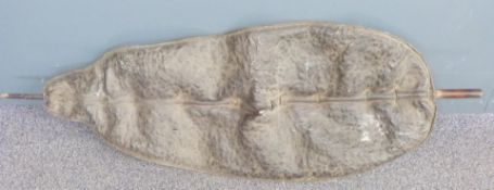 A 19thC leather African tribal shield, probably Kenya/East Africa, W133 x H43cm, formerly the
