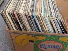 Approximately 80 albums including Bob Dylan, Dire Straits, Leonard Cohen and some classical