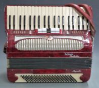 Selmer Invicta 'Rapallo' 120 bass piano accordion in red pearloid finish, with five treble