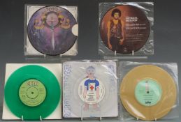 Approximately 50 seven inch picture discs and coloured vinyl including UK Subs, Michael Jackson,