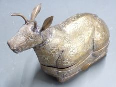 A quantity of Nepalese and Tibetan metal figures and a chess set including cabochon set examples,