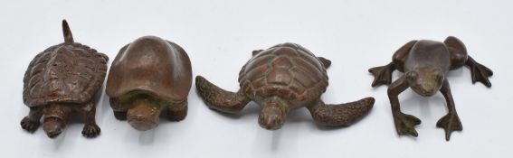 Four Japanese bronzes, two tortoise, a turtle and a frog, two marked to base, largest 5 x 6cm