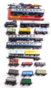 Eighteen Hornby and similar 00 gauge model railway locomotives, coaches, wagons and tankers, one