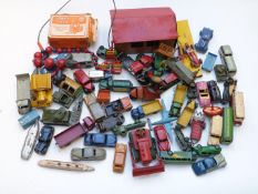 A collection of over sixty Dinky diecast vehicles and tin storage shed, including Blaw Knox