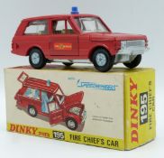 Dinky Toys diecast model Fire Chief's Car with red body, blue windows and Fire Service decals,