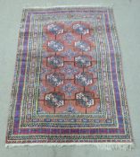Turkoman rug with ten guls and multiple geometric borders, 183 x 122cm