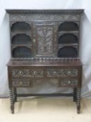 A 19th/ 20thC carved oak dresser of unusually small size, W106 x D44 x H147cm