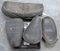 Four various motorbike seats