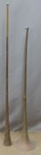 Two copper horns, largest 104cm