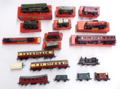 Eighteen Tri-ang 00 gauge model railway locomotives, coaches and wagons, ten in original boxes