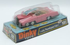 Dinky Toys diecast model Lady Panelope's Fab 1 with pink body, gold interior, figures and