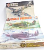 Three Airfix 1:24 scale model kits comprising two Hawker Hurricane Mk1 14002-5 and 09502-8 and
