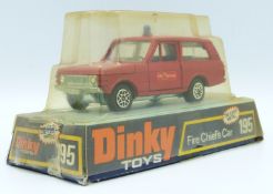 Dinky Toys diecast model Fire Chief's Car with red body, blue windows and Fire Service decals,