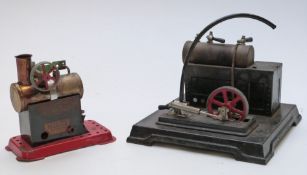 Two stationary live steam engines, one Bing the other Mamod.