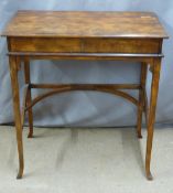 A 19thC mahogany writing table with mechanical lift up lid, slide out leather writing platform and