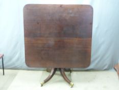 Victorian mahogany breakfast table raised on a quatrefoil base, W122 x D115 x H72cm