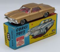 Corgi Toys diecast model Buick Riviera with gold body, red interior and silver hubs, 245, in