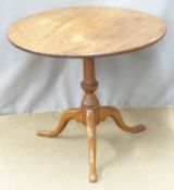 A 19thC mahogany circular tilt top table raised on triform base, H75 x diameter 79cm