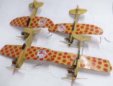 Four control line model aircraft powered by compression ignition or diesel engines, comprising two