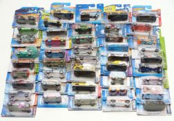 Forty-five Hot Wheels diecast model vehicles, all in original blister packs.