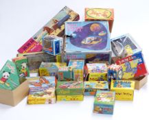 A collection of clockwork tinplate and similar model toy boxes including Space Explorer Ship X-3,