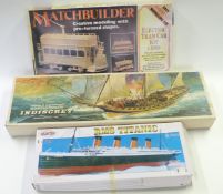 Three model kits comprising wooden model ship, Matchbuilder Tram Car and RMS Titanic, all in