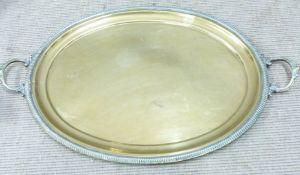 A plated twin handled tray, pewter items including 18thC plates with touch marks, Tudric tankard etc