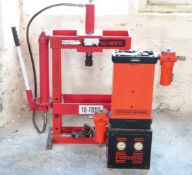 A ten ton bench press by Strong-Arm and a Pneudri Desiccant Air Dryer by Domnick Hunter