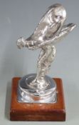 Rolls Royce Spirit of Ecstasy mascot with spring base, on mahogany plinth, height 14.5cm