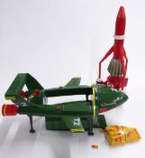 Two Thunderbird vehicles Thunderbird 3 with sounds, Thunderbird 2 with Thunderbird 4 inside.