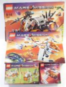 Four Lego Mars Mission construction sets Armoured Drilling Unit 7699, Recon Dropship 7692, Astro