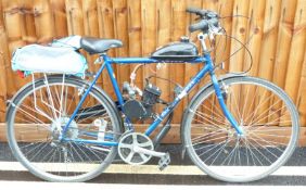 Raleigh bicycle with Shimano gears etc, fitted with a small two stroke engine 10%+VAT buyers premium
