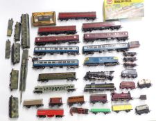 A collection of Hornby, Tri-ang and similar 00 gauge locomotives, coaches and wagons, some in
