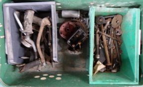 Motorbike parts including levers, nuts and bolts