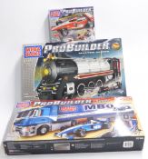 Three Mega Bloks Pro Builder construction sets Master Series Steam Express 9778 and Racing Rig