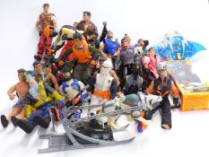 Twenty-one Action Man figures in various outfits together with vehicles, animals and accessories,
