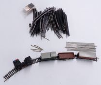 Trix N gauge train set with two locomotives, two wagons and track.