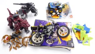 A collection of Lego construction kits and Zoid toys including Technic, motocross bike etc.