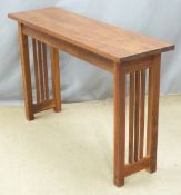 A contemporary hardwood hall table, W122 x D36 x H76cm