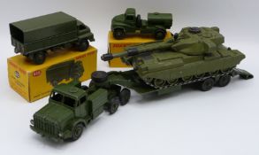 Four Dinky Toys diecast model vehicles comprising Army Covered Wagon 623, Army Water Tanker 643,