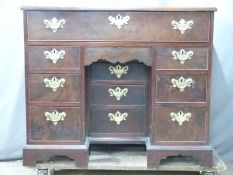A 19thC mahogany twin pedestal desk, the secretaire style top drawer with fitted interior and