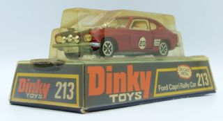 Dinky Toys diecast model Ford Capri Rally Car with metallic red body, black bonnet and racing number