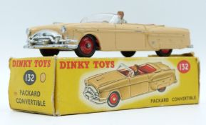 Dinky Toys diecast model Packard Convertible with beige body, driver, red interior and hubs, 132, in
