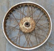 Four motorbike wheels including early British Hub Company