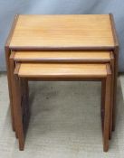 A retro / mid century modern nest of G Plan tables and two unmarked upholstered chairs, W54 x D42
