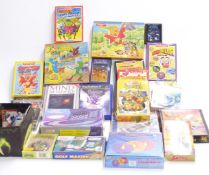 A collection of vintage video games, puzzles and card games including Playstation games, Rubics