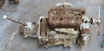 Austin Seven magneto ignition engine and three speed gearbox, complete with fan and dynamo, engine